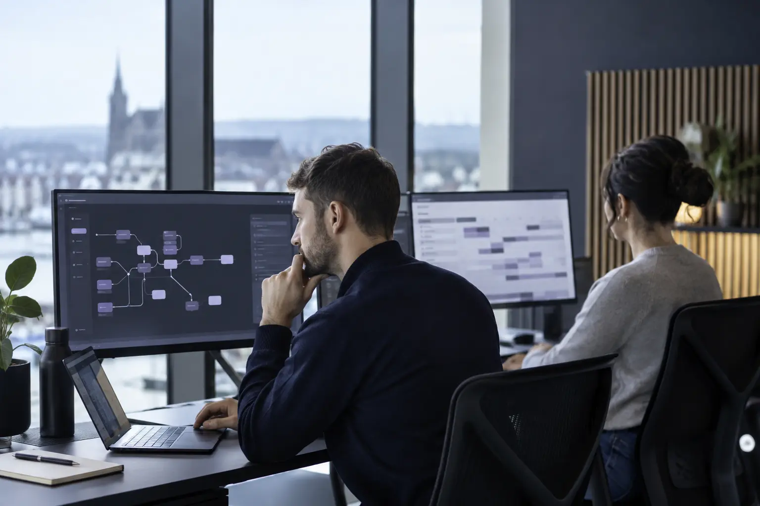 Technical specialists configuring automated scheduling and dispatch workflows