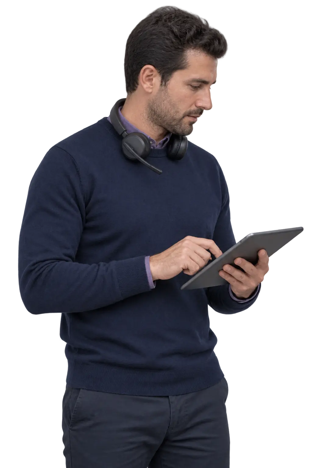 Platform support engineer monitoring enterprise systems using a laptop and tablet
